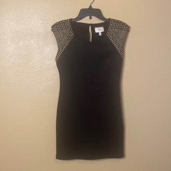 Marilyn Monroe cocktail dress. Black w/gold brads on shoulders. - Picture 1 of 5